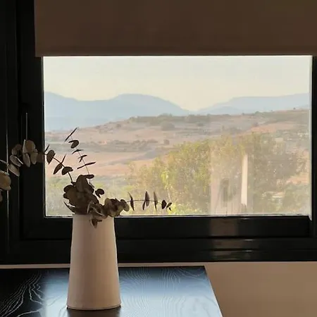 Komos View